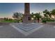 Elegant stone entrance feature with 'Tuscany' signage, welcoming you to the community at 1272 Olivia Pkwy, Henderson, NV 89011