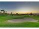 Beautifully landscaped golf course with sand trap and flag, ready for play at 1272 Olivia Pkwy, Henderson, NV 89011