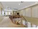 Hallway featuring carpet flooring, recessed lighting, and wood and iron railing at 1272 Olivia Pkwy, Henderson, NV 89011