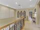 Hallway featuring carpet flooring, recessed lighting, and wood and iron railing at 1272 Olivia Pkwy, Henderson, NV 89011