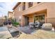 Well-appointed outdoor kitchen features granite counters and a built-in grill with a sink at 1272 Olivia Pkwy, Henderson, NV 89011