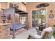 Cozy outdoor seating area with pergola, swing, and a heater for year-round comfort at 1272 Olivia Pkwy, Henderson, NV 89011