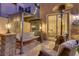 Cozy outdoor patio with comfortable seating, including porch swing, and outdoor heater at 1272 Olivia Pkwy, Henderson, NV 89011