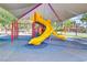 Fun playground with covered slide and climbing features for outdoor play at 1272 Olivia Pkwy, Henderson, NV 89011