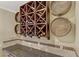 Stylish wine cellar with decorative wine barrels and wooden wine racks on the wall, with granite countertop at 1272 Olivia Pkwy, Henderson, NV 89011