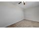 A standard bedroom with plush carpeting and neutral colored walls at 1450 Fern St, Pahrump, NV 89060