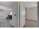 Hallway view into bedroom showing a large closet; living room visible in background at 1450 Fern St, Pahrump, NV 89060