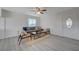Bright living room features modern furniture and large windows for natural light at 1450 Fern St, Pahrump, NV 89060