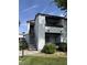 Charming two-story condo features a private balcony and well-maintained landscaping at 1455 E Katie Ave # L23, Las Vegas, NV 89119