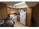 Well-lit kitchen with ample cabinet space and standard white appliances at 1455 E Katie Ave # L23, Las Vegas, NV 89119