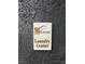 A community laundry center sign for Valencia, providing on-site convenience for residents at 1455 E Katie Ave # L23, Las Vegas, NV 89119