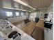 Well-lit laundry room featuring multiple machines, providing residents a convenient amenity at 1455 E Katie Ave # L23, Las Vegas, NV 89119