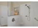 Bright bathroom featuring a glass enclosed walk-in shower, and a shower bench at 1766 Baja Ln, Henderson, NV 89012