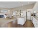 Spacious open-concept layout seamlessly integrates kitchen, dining, and living areas, perfect for modern living and entertaining at 1766 Baja Ln, Henderson, NV 89012