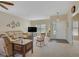 Spacious living room with a comfortable sofa, rocking chair, and bright natural light at 1766 Baja Ln, Henderson, NV 89012