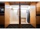 Well-organized walk-in closet with built-in shelving, hanging rods, and convenient storage solutions at 2000 N Fashion Show Dr # 4200, Las Vegas, NV 89109