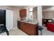 Well-designed kitchen with granite countertops, modern appliances, and a convenient breakfast bar at 2120 Ramrod Ave # 513, Henderson, NV 89014