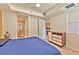 Comfortable bedroom featuring contemporary furnishings, tray ceiling, and access to the bathroom and kitchen at 2405 W Serene Ave # 703, Las Vegas, NV 89123