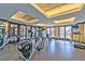 Well-equipped fitness center with modern exercise machines, mirrored walls, and ample natural light at 2405 W Serene Ave # 703, Las Vegas, NV 89123