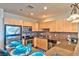 Well-equipped kitchen featuring stainless steel appliances, granite counters, and a stylish backsplash at 2405 W Serene Ave # 703, Las Vegas, NV 89123