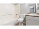 Clean bathroom featuring a shower-tub combo, granite countertop, and tile flooring at 2750 S Durango Dr # 2061, Las Vegas, NV 89117