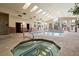 Bright indoor pool and jacuzzi area with skylights and large windows, perfect for year-round enjoyment at 2750 S Durango Dr # 2061, Las Vegas, NV 89117