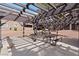 Charming picnic area with wooden tables beneath a pergola, ideal for outdoor gatherings at 2750 S Durango Dr # 2061, Las Vegas, NV 89117