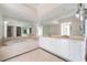 Bright bathroom with a large mirror, vanity, soaking tub, and elegant fixtures at 2877 Paradise Rd # 1806, Las Vegas, NV 89109