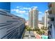 Stunning city view featuring tennis courts, a pool, and high rise buildings under a clear sky at 2877 Paradise Rd # 1806, Las Vegas, NV 89109