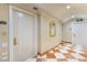 Condo hallway with apartment number 1806, exit sign, and patterned floors at 2877 Paradise Rd # 1806, Las Vegas, NV 89109