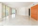 Bright living room featuring marble floors, neutral tones, and large windows for natural light at 2877 Paradise Rd # 1806, Las Vegas, NV 89109