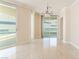 Bright and airy living area with marble flooring, modern lighting, and floor-to-ceiling windows at 2877 Paradise Rd # 1806, Las Vegas, NV 89109
