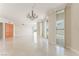 Bright living room with polished tile floors, large windows, and modern lighting at 2877 Paradise Rd # 1806, Las Vegas, NV 89109