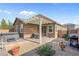 The home features a backyard with patio under pergola, a hot tub, and grill at 2924 Duverney Ave, Henderson, NV 89044