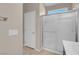 Modern bathroom with a glass-enclosed shower and sleek fixtures at 2924 Duverney Ave, Henderson, NV 89044