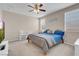 Relaxing bedroom featuring soft lighting and a neutral color scheme, perfect for unwinding at 2924 Duverney Ave, Henderson, NV 89044