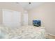 Cozy bedroom features a white closet door and a ceiling light at 2924 Duverney Ave, Henderson, NV 89044