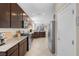 Spacious kitchen featuring stainless steel appliances, granite countertops, and ample cabinet space at 2924 Duverney Ave, Henderson, NV 89044