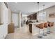 Stylish kitchen featuring granite countertops, stainless steel appliances, and barstool seating at 2924 Duverney Ave, Henderson, NV 89044