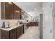 Modern kitchen with granite countertops, stainless steel appliances, and lots of cabinet storage at 2924 Duverney Ave, Henderson, NV 89044