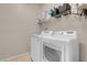 The laundry room features updated washer and dryer machines at 2924 Duverney Ave, Henderson, NV 89044
