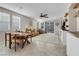 Relaxing living room with a view to the outdoor patio and an open layout to the dining area at 2924 Duverney Ave, Henderson, NV 89044
