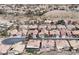 Property aerial view showcasing the neighborhood setting, landscaping, and proximity to nearby amenities at 2986 Matese Dr, Henderson, NV 89052