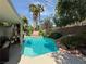 Inviting backyard pool and spa with lush landscaping and private patio area at 2986 Matese Dr, Henderson, NV 89052