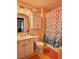 Charming bathroom features a sink, toilet, and whimsical mermaid-themed decor with unique lighting at 2986 Matese Dr, Henderson, NV 89052