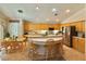 Beautiful kitchen with stainless steel appliances, a kitchen island and plenty of cabinet space and storage at 2986 Matese Dr, Henderson, NV 89052