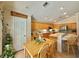 Bright eat-in kitchen featuring stainless steel appliances, a dining area, and plenty of counter space at 2986 Matese Dr, Henderson, NV 89052