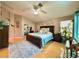 Bright main bedroom features a ceiling fan, ensuite bathroom, and ample natural light at 2986 Matese Dr, Henderson, NV 89052