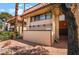 The building's exterior features a tan facade, red tile roof, desert landscaping, and mature palm trees at 3120 S Eastern Ave # 5, Las Vegas, NV 89169
