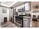 Updated kitchen features stainless steel appliances and light gray cabinetry at 3120 S Eastern Ave # 5, Las Vegas, NV 89169